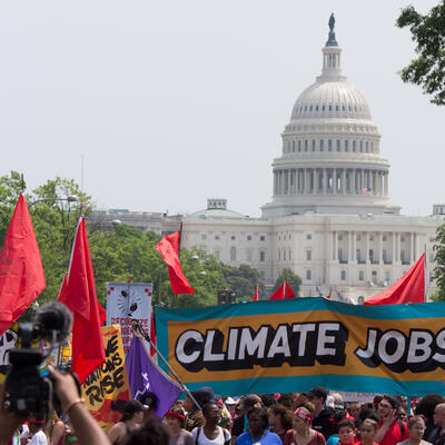 protest banner CLIMATE JOBS