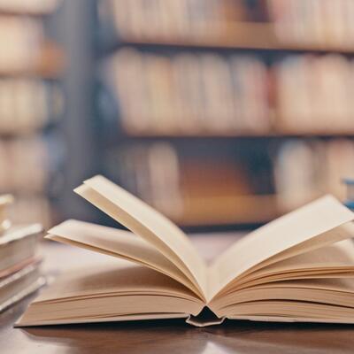 A book lies open on a table