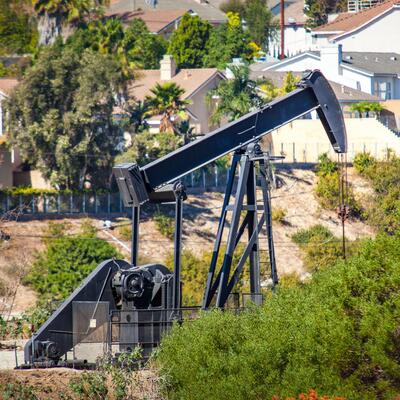 An oil derrick in a residential neighborhood in Inglewood