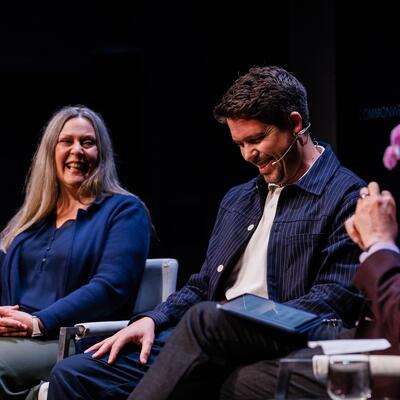 Laurene Allen and Carlos Mallo Molina on stage with Greg Dalton at Climate One