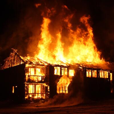 A house is consumed by flames