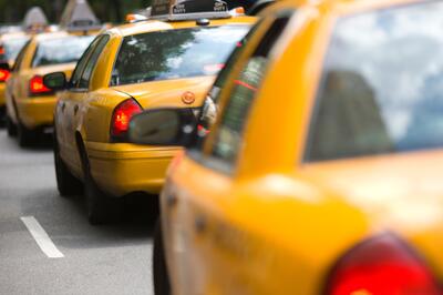 Yellow taxicabs queue in New York City
